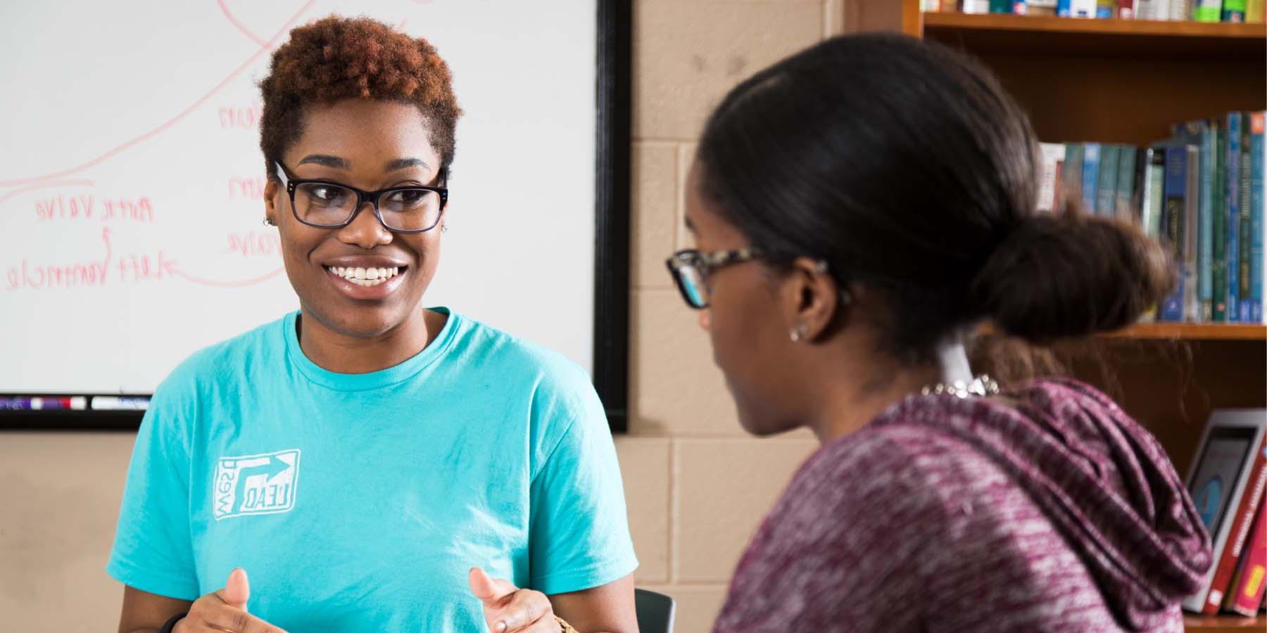 A tutor helping a student