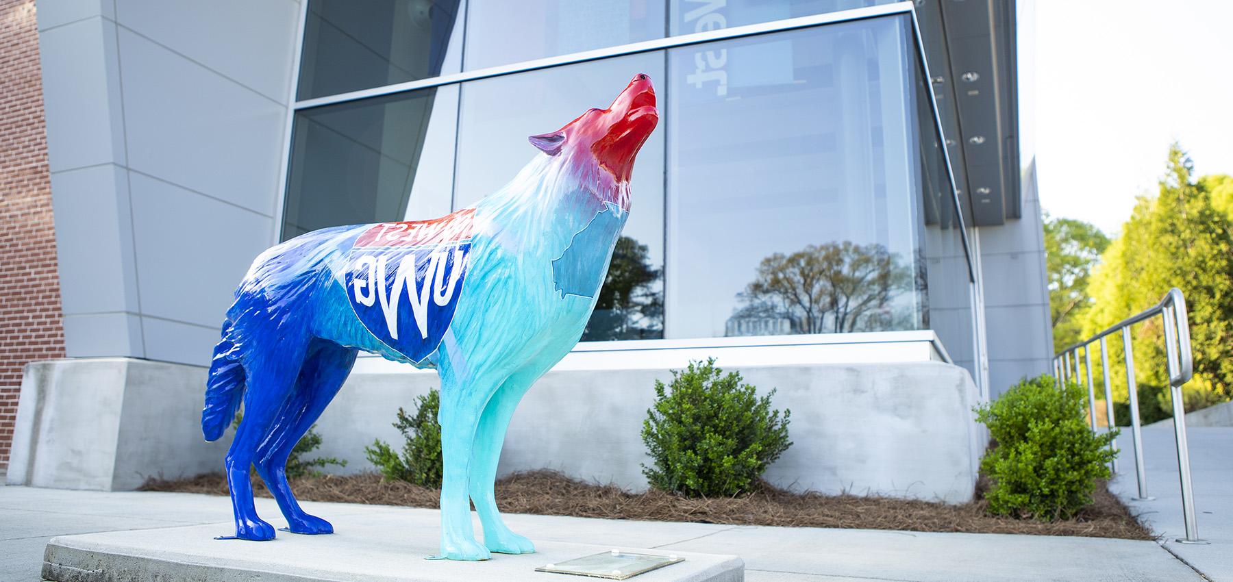 Wolf statue in front of the Admissions building